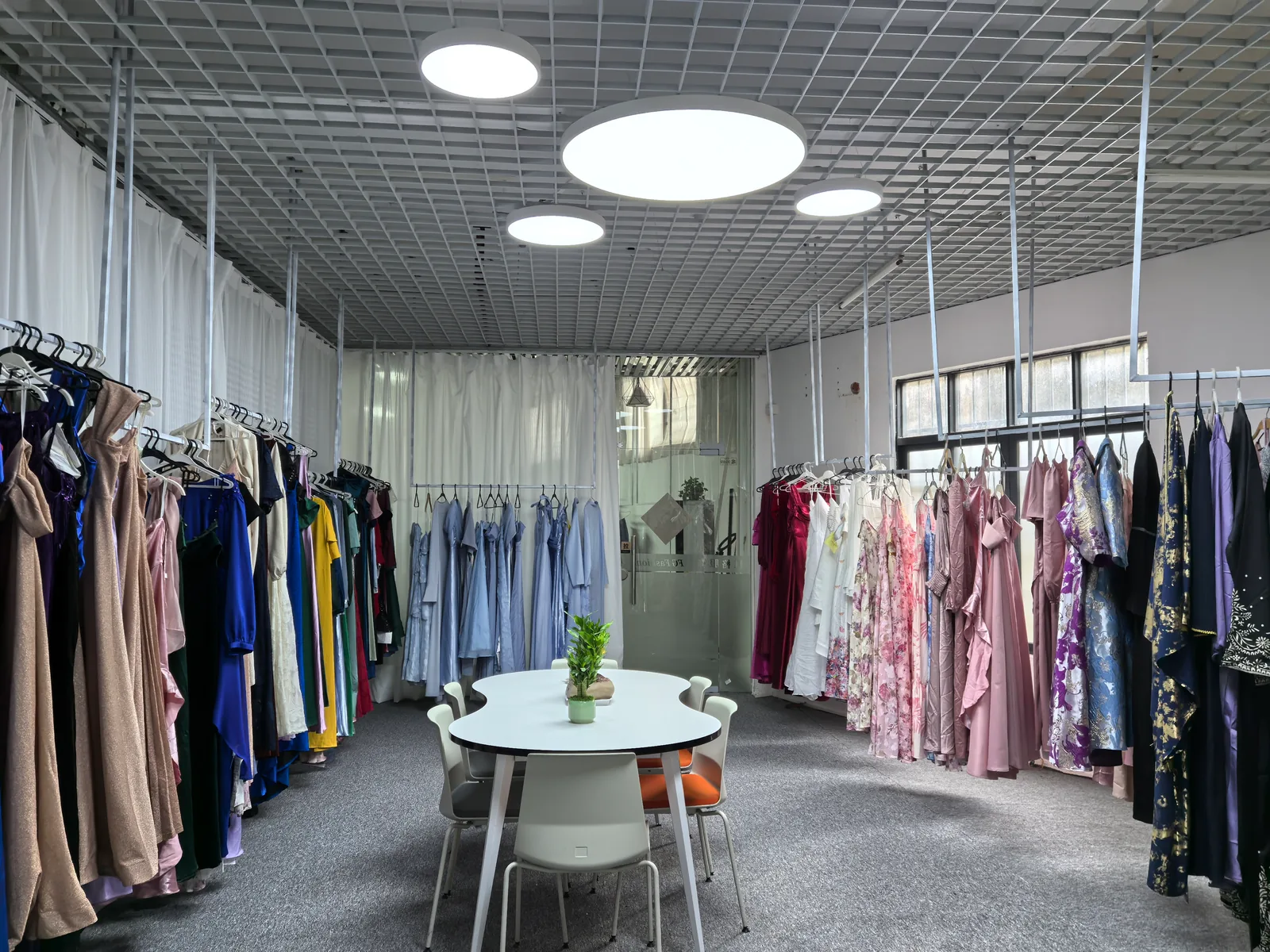 Guangzhou women's clothing manufacturer showroom with sample garments